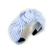 Load image into Gallery viewer, Blue and white striped headband with a knotted detail in the center, set against a plain white background, conveying a trendy, nautical style.