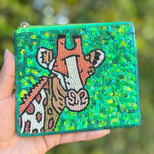 Load image into Gallery viewer, Animal-themed beaded zip pouch with giraffe design on a bright green sequin background.