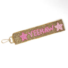 Load image into Gallery viewer, Beaded keychain with 'Yeehaw' and star designs on a white background