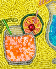 Load image into Gallery viewer, Close-up of intricate hand beading and colorful sequin details on a cocktail and martini inspired pouch.