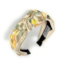 Load image into Gallery viewer, Elegant fabric headband with colorful floral embroidery in yellow, orange, and green. 