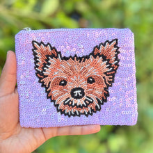 Load image into Gallery viewer, Hand-beaded Yorkshire Terrier pouch with a fluffy dog face on a lavender sequin background by Twine and Love.
