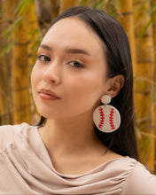 Load image into Gallery viewer, Stylish baseball-themed earrings worn by a model