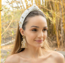 Load image into Gallery viewer, Trendy gold cheer earrings paired with a stylish headband.