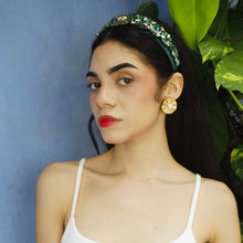 Load image into Gallery viewer, Beauty portrait of a woman wearing a decorative headband and statement earrings.