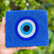 Load image into Gallery viewer, Handcrafted blue beaded clutch with an eye design