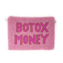 Load image into Gallery viewer, A pink textured pouch with the words 'BOTOX MONEY' beaded in pink letters outlined in gold, shown on a plain white background.