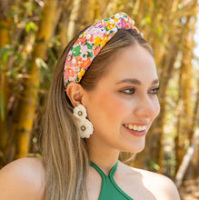 Load image into Gallery viewer, Chic earrings displayed by a woman with a colorful headband and natural backdrop.
