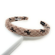 Load image into Gallery viewer, Chic headband with a light beige color and decorative brown bows.