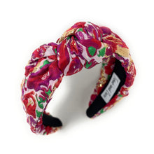 Load image into Gallery viewer, Floral patterned headband on a white background
