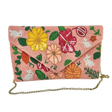 Load image into Gallery viewer, Decorative purse with a pink background and vibrant floral patterns