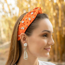 Load image into Gallery viewer, Trendy fashion accessories including a vibrant headband and statement earrings for women.