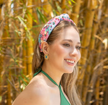 Load image into Gallery viewer, Close-up of a woman wearing an elegant seashell headband in a sunny outdoor setting.