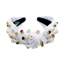 Load image into Gallery viewer, An embellished fabric headband featuring unique decorative elements.