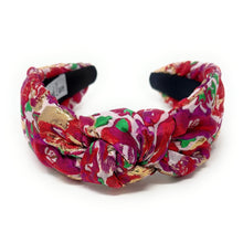 Load image into Gallery viewer, Floral patterned headband on a white background