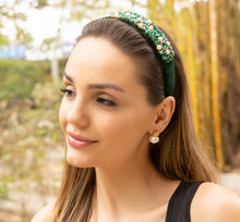Load image into Gallery viewer, Fashion accessories featuring a green headband and pearl earrings on a woman.