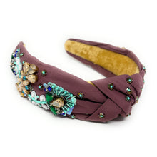 Load image into Gallery viewer, Ornate maroon headband with intricate blue and green beadwork, gold floral accents, and a soft yellow interior, evoking elegance and craftsmanship.
