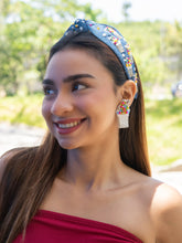 Load image into Gallery viewer, Fashionable headband featuring snow and ice cream designs, worn by a smiling woman.