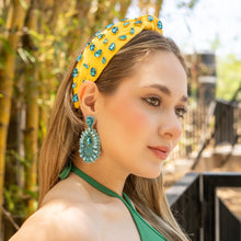 Load image into Gallery viewer, yellow embellished headband and turquoise drop earrings in natural sunlight.
