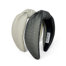 Load image into Gallery viewer, Side view of ivory and black polka dot headband with a padded knotted top.