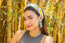 Load image into Gallery viewer, Model wearing a colorful fruit-themed headband and earrings