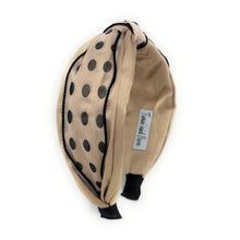 Load image into Gallery viewer, Beige headband with black polka dots on a white background