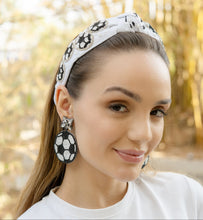 Load image into Gallery viewer, A woman wearing a soccer-themed headband and earrings, showcasing her stylish accessories.
