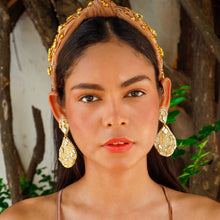 Load image into Gallery viewer, Close-up of a woman wearing a jeweled headband and earrings, highlighting her fashion sense.