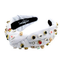Load image into Gallery viewer, A stylish decorative headband with colorful embellishments.
