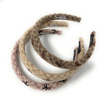 Load image into Gallery viewer, Set of three stylish wool headbands with bow patterns in neutral colors.