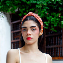 Load image into Gallery viewer, A stylish young woman with a headband posing outdoors.