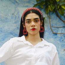 Load image into Gallery viewer, Close-up beauty shot of a model with red lipstick and accessories, highlighting her fashion sense.