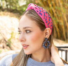 Load image into Gallery viewer, Trendy women's fashion accessories including a pink headband and decorative earrings.