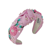 Load image into Gallery viewer, Trendy flower-patterned headband in pink, perfect for fashion enthusiasts.