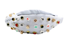Load image into Gallery viewer,  A unique patterned headband with intricate designs and colors.