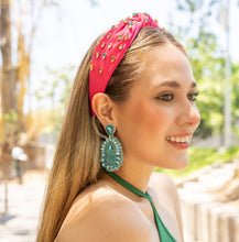 Load image into Gallery viewer, Trendy pink headband and turquoise earrings worn by a smiling woman in a natural setting.