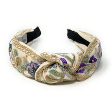 Load image into Gallery viewer, Decorative headband with floral patterns on a white background