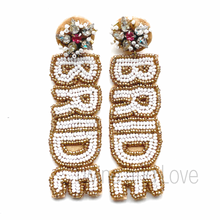 Load image into Gallery viewer, Bride earrings, bride champagne bottle earrings, bridal earrings, bridal shower gift, bachelorette earrings, bridal gift, bride to be gift, bachelorette gift, bridal shower, bride statement earrings, bridal gift, bachelorette party, earrings for bride, best friend gift, bachelorette gift, white bride earrings, birthday gift for bride, party treats for bride. bride to be gift, gifts for bridal shower, gift for bride, gift for bachelorette, gift for a future bride, future bride gift, bridesmaids gifts