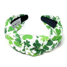 Load image into Gallery viewer, headbands for women, stylish headbands, headband style, top knot headband, green top knot headband, lucky charm headband, hair band, trendy headbands, top knotted headband, st patricks headband, handmade headbands, top knotted headband, velour knotted headband, Clover leaf hair band for women, trendy headband, statement headbands, hair accessories, twist headband, chic headband, st patricks headband, clover leaf knot headband, st paddy’s headband, green hair accessories, four leaf clover headband