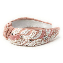Load image into Gallery viewer, Elegant statement headband with layered pearls, sparkling crystals, and delicate pink embroidery on a blush fabric base.