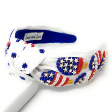 Load image into Gallery viewer, headband for women, Patriotic Knot headband, USA Flag headbands, Patriotic knotted headband, summer top knot headband, USA stars top knot headband, USA flag bow knotted headband, USA Patriotic hair band, USA party, beaded USA knot headband, statement headbands, top knotted headband, knotted headband, Fourth of July gifts,  embellished headband, gemstone knot headband, luxury headband, embellished knot headband, jeweled knot headband, Fourth of July headbands, 4th of July headband