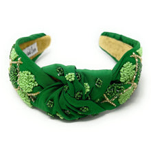 Load image into Gallery viewer, headbands for women, green knotted headband, headband style, top knot headband, green top knot headband, lucky charm headband, lucky charm hair band, green knot headband, top knotted headband, St Patrick’s headband, handmade headbands, top knotted headband, hand bead knotted headband, Clover leaf hair band for women, Hand bead St. Patrick’s headband, statement headbands, embellished headband, chic headband, clover leaf knot headband, st paddy’s headband, green hair accessories, four leaf clover headband