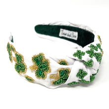 Load image into Gallery viewer, headbands for women, green knotted headband, headband style, top knot headband, green top knot headband, lucky charm headband, lucky charm hair band, green knot headband, top knotted headband, St Patrick’s headband, handmade headbands, top knotted headband, hand bead knotted headband, Clover leaf hair band for women, Hand bead St. Patrick’s headband, statement headbands, embellished headband, chic headband, clover leaf knot headband, st paddy’s headband, green hair accessories, four leaf clover headband