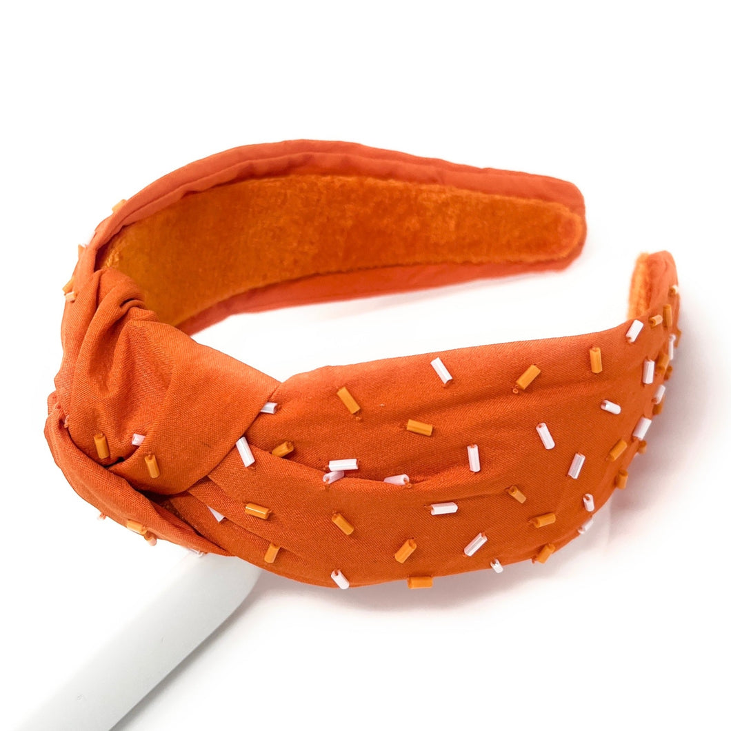 headband for women, sprinkles Knotted headband, headbands for women, birthday headbands, top knot headband, sprinkles top knot headband, orange headband, sprinkles hair band, orange white headbands, top knotted headband, statement headbands, Orange white Knot headband, knotted headband, Vols, Vols hair accessories, fashion headbands, hookem headband, Hook’em hair accessories, gemstone headband for women, luxury headband, jeweled headband, happy birthday headbands 