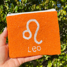 Load image into Gallery viewer, Zodiac Signs Coin Purse Pouch, leo Beaded Coin Purse, leo bead Coin Purse, leo Beaded Purse, Astrology Signs Coin Purse, Best Friend Gift, Leo beaded coin pouch, Zodiac Wallets for her, beaded coin purse, girl birthday gifts, boho pouch, boho accessories, best friend gifts, coin purse, zodiac signs gifts, money coin pouch, gift bags, best selling items, bachelorette gifts, birthday gifts, preppy beaded wallet, party favors, party favors, zodiac signs accessories. 