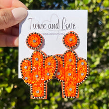 Load image into Gallery viewer, Bachelorette earrings, bride to be gifts, LETS GO GIRLS EARRINGS , Succulent earrings, cowgirl earrings, cowgirl beaded earrings, cowgirl beaded accessories, cowgirl accessories, cowgirl earrings, cowgirl beaded earrings, bachelorette gifts, bachelorette beaded earrings, bachelorette party favors, bridal shower party favors, bachelorette gifts for her, bride to be gifts, country girl gifts, country girl earrings, Yeehaw Beaded earrings, Succulent earrings, Cactus earrings, Yeehaw accessories