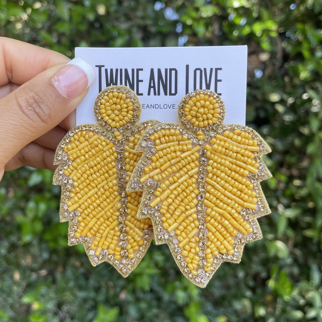 beaded earrings, statement earring, tropical beaded earrings, seed bead tropical earrings, summer earrings, best seller earrings, must have accessories, best seller accessories, friends gifts, best friend birthday gift, earrings lover, latest earrings, bead earrings,handmade sunflower earrings, sunflower earrings, birthday gift for her, birthday gift, best friend gift, yellow color lover gift, tropical gifts, yellow color party theme, yellow earrings, beach accessories, YELLOW party, tropical party theme