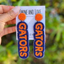 Load image into Gallery viewer, Football Earrings, GameDay Earrings, College Football Earrings, Team Earrings, GameDay Outfit, Horns Hook’em earrings, earrings for women, summer earrings, game day earrings, Gators earrings, team game, college team earrings, game day outfit, football earrings, college gifts, Florida Gators earrings, team earrings, college team gifts, Gators earrings, team beaded earrings, college earrings, gameday outfit, Gators beaded earrings, Florida Gators earrings, Gators college gifts, Florida Gators beaded earrings