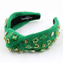 Load image into Gallery viewer, headbands for women, white green knotted headband, headband style, top knot headband, green top knot headband, lucky charm jeweled headband, lucky charm hair band, green Jeweled knot headband, St Patrick’s Jeweled headband, top knotted headband, hand bead knotted headband, Clover leaf hair band for women, St Patrick’s Embellished headband, statement headbands, embellished headband, chic headband, clover leaf knot headband, st paddy’s headband, green hair accessories, four leaf clover headband