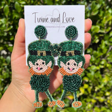 Load image into Gallery viewer, Green Beaded Earrings, St. Patrick’s Day Earrings, St. Pats Earrings, Leprechaun Beaded Earrings, Seed Bead, Leprechaun earrings, Green leprechaun earrings, Hat Green beaded earrings, St. Patricks beaded earrings, Leprechaun hat beaded earrings, St, Patricks beaded earrings, leprechaun seed bead earrings, Green seed bead earrings, St. Patrick’s day gifts, St. Patrick’s day accessories, holiday beaded accessories, Holiday red accessories, Holiday St Patrick’s Day earrings, Green gifts, best Selling items